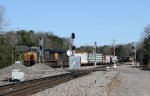 CSX 842 leads train Q492-04 out of the yard while Q491 waits